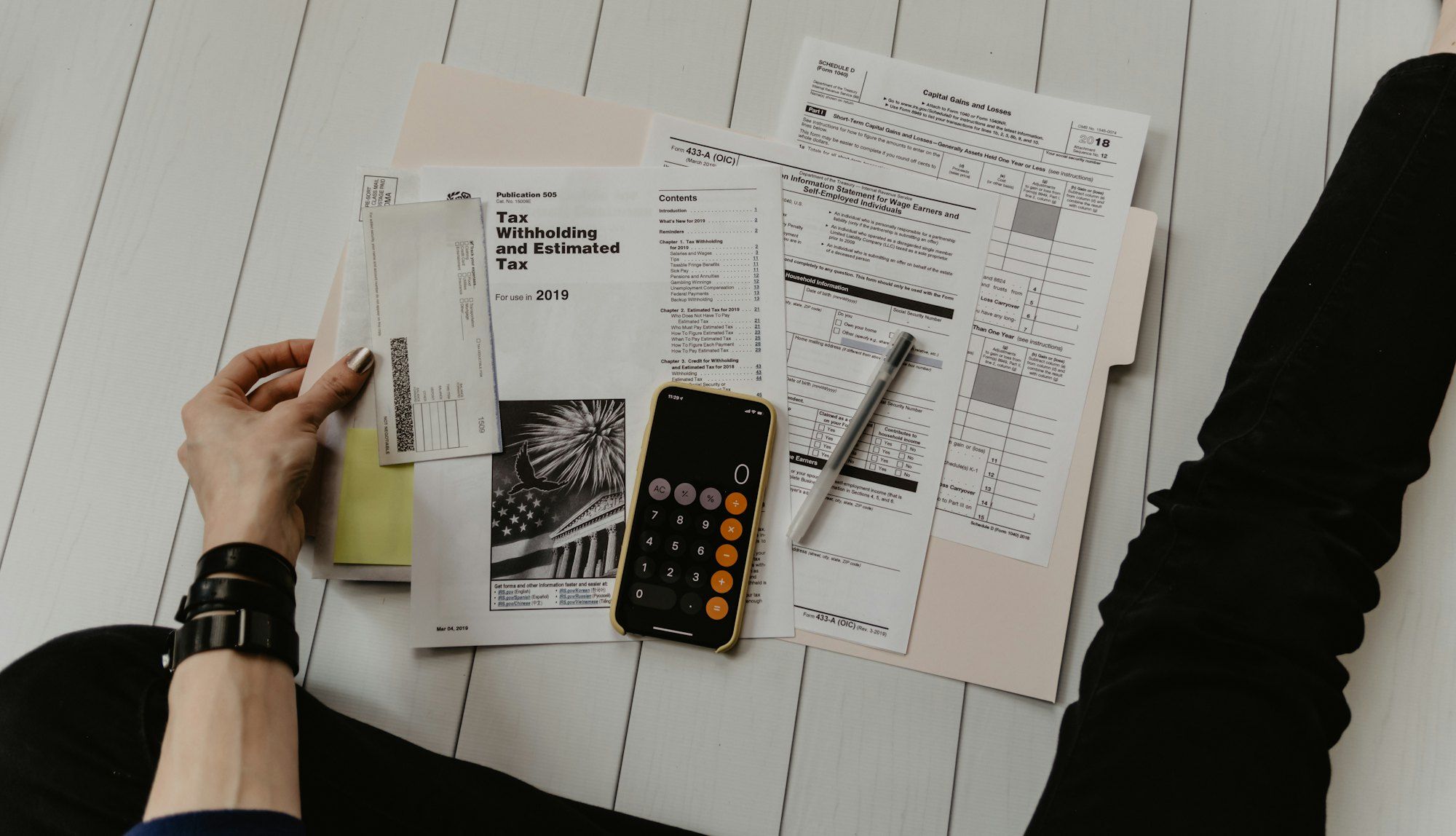 Open ledger and paperwork